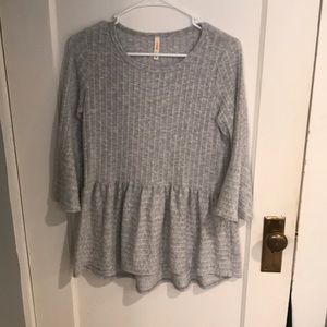 Grey peplum top with bell sleeves